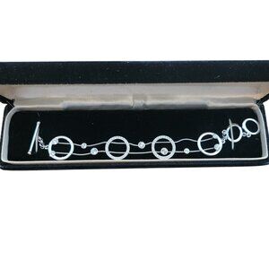 Jacobs Jewelers Silver Tone Modern Minimalist Circle and Toggle Bracelet, CZ